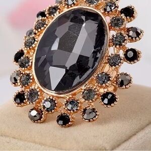 Elegant Black and Gold Statement Ring